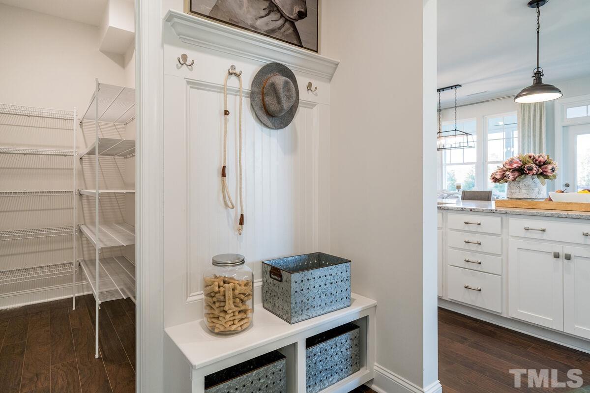 2201 Goudy Drive Raleigh, NC 27615 - Photo 8 of 24 a view of a hallway with washer and dryer