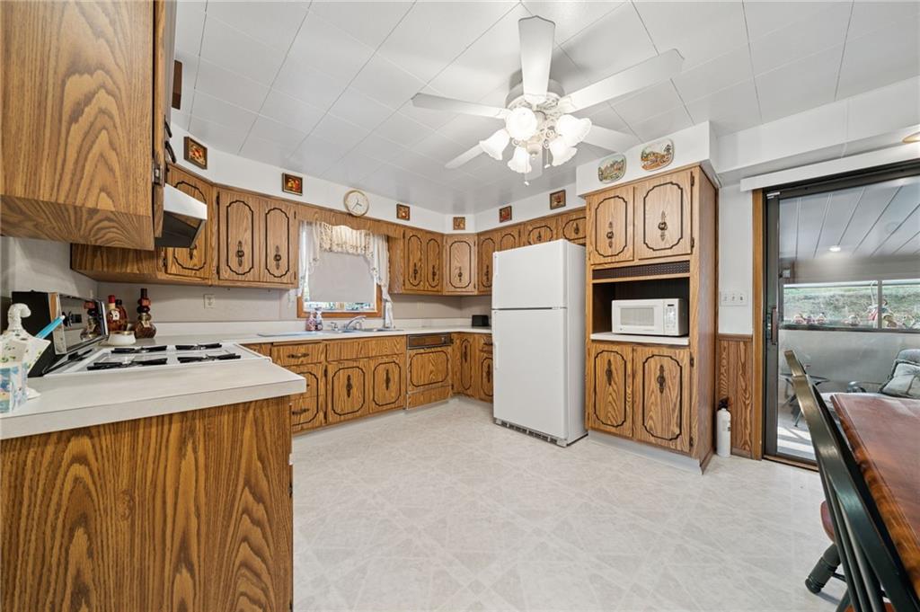 19 Hoon Street Monongahela, PA 15063 - Photo 12 of 37 a kitchen that has a lot of cabinets and refrigerator
