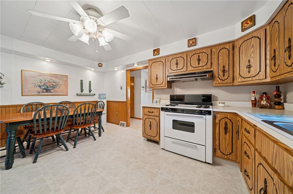 19 Hoon Street Monongahela, PA 15063 - Photo 9 of 37 a kitchen with stainless steel appliances granite countertop a sink and cabinets