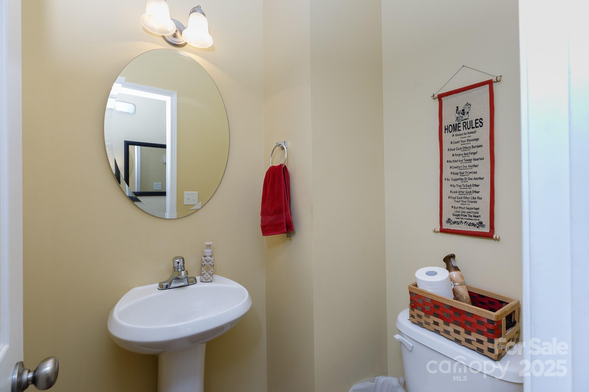 722 Chelton Lane Fort Mill, SC 29715 - Photo 12 of 19 a bathroom with a sink and a mirror