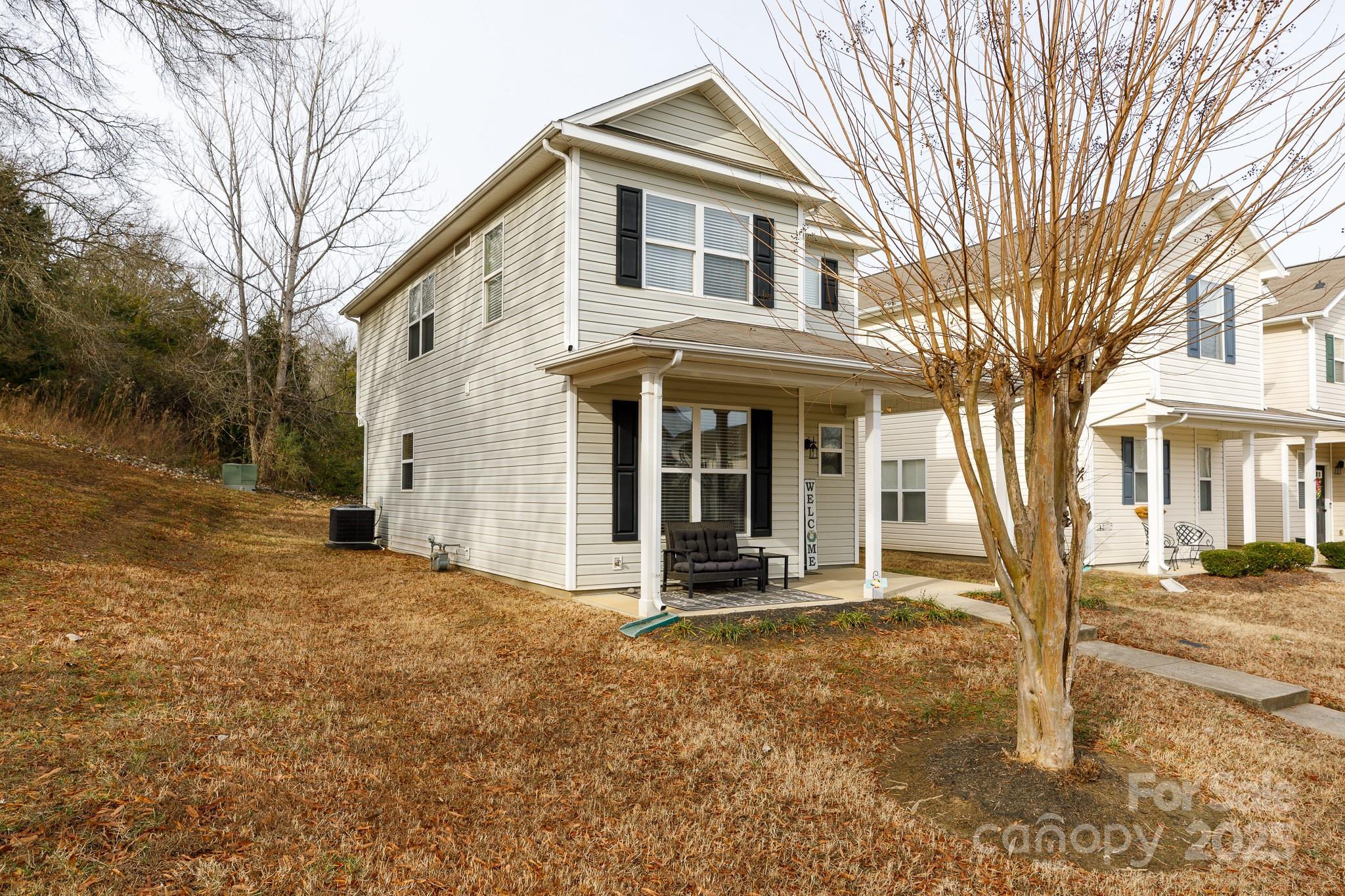 722 Chelton Lane Fort Mill, SC 29715 - Photo 2 of 19 a front view of a house with a yard