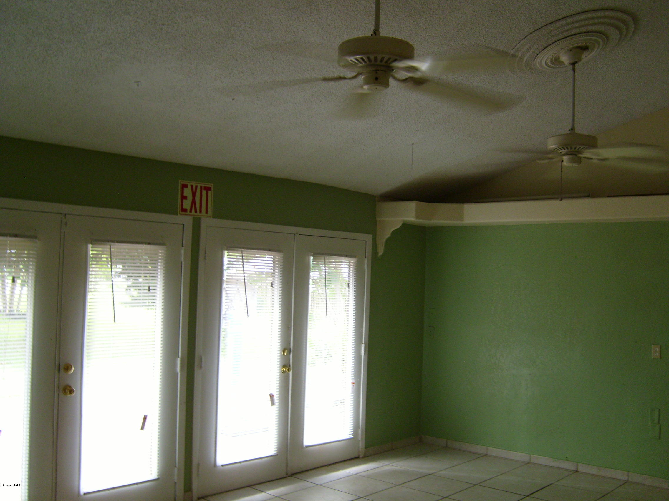 1474 Meadowbrook Road Northeast, Unit NE Palm Bay, FL 32905 - Photo 11 of 24 a view of a room with a hallway