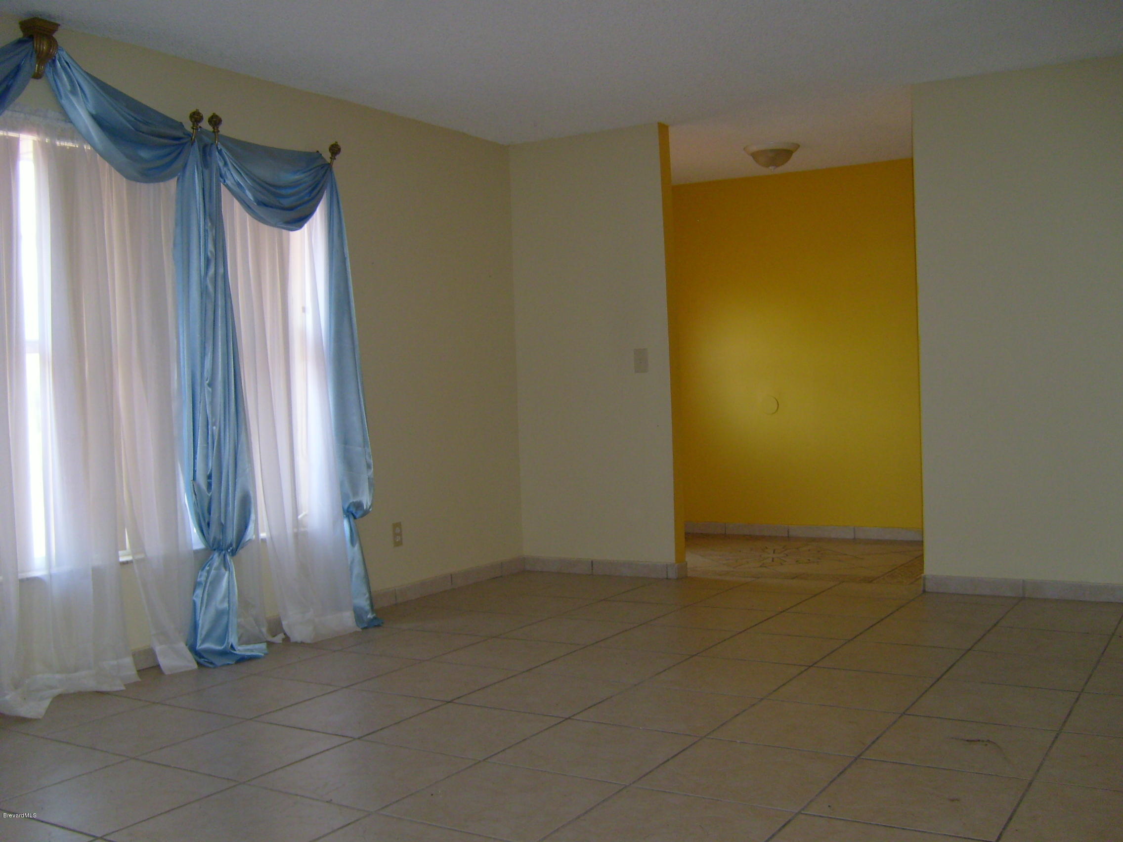 1474 Meadowbrook Road Northeast, Unit NE Palm Bay, FL 32905 - Photo 4 of 24 a view of a bathroom with shower