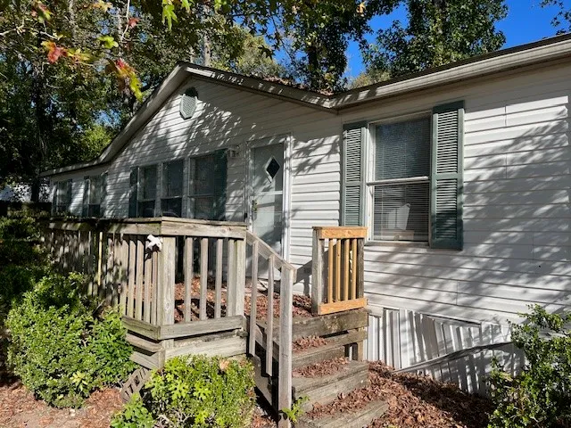 front view of a house with a small yard
