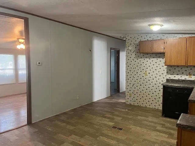 a view of a utility room with a fireplace