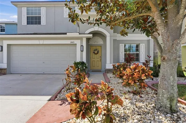 a view of front door with wooden door