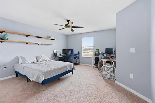 a backyard of a house with seating space