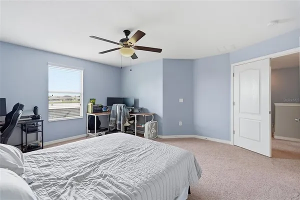 an aerial view of a house with a lake view