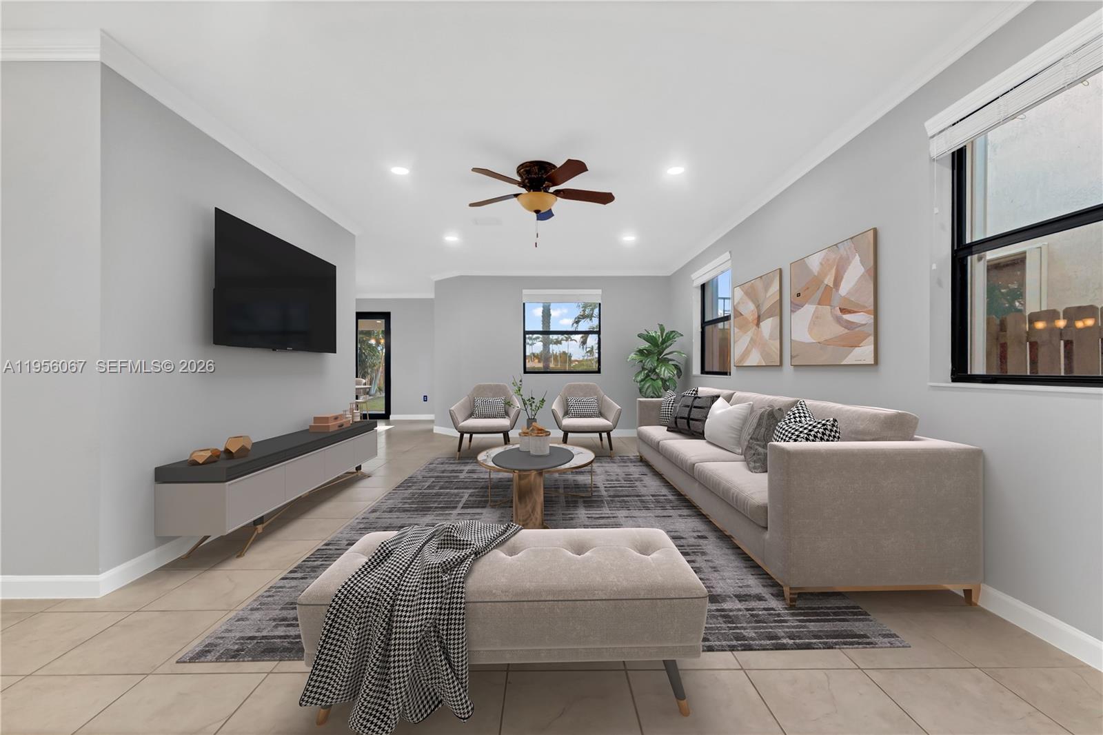 3401 Southeast 5th Street Homestead, FL 33033 - Photo 2 of 32 a living room with furniture and a flat screen tv