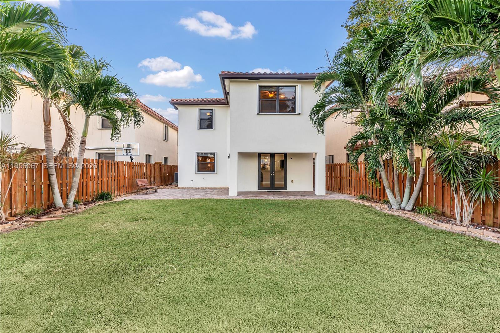 3401 Southeast 5th Street Homestead, FL 33033 - Photo 21 of 32 a front view of house with yard and seating area