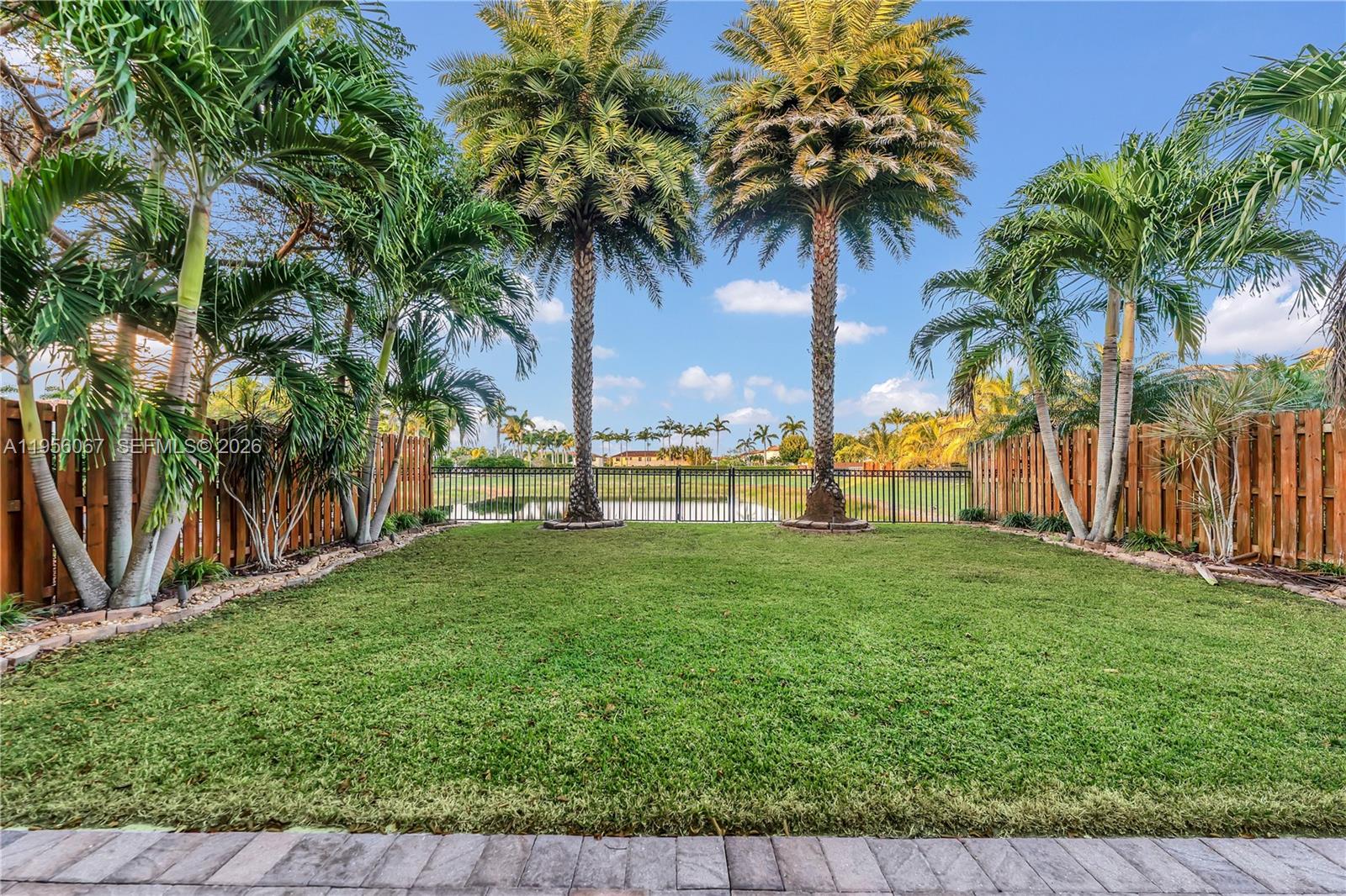 3401 Southeast 5th Street Homestead, FL 33033 - Photo 22 of 32 a view of a yard with a palm trees