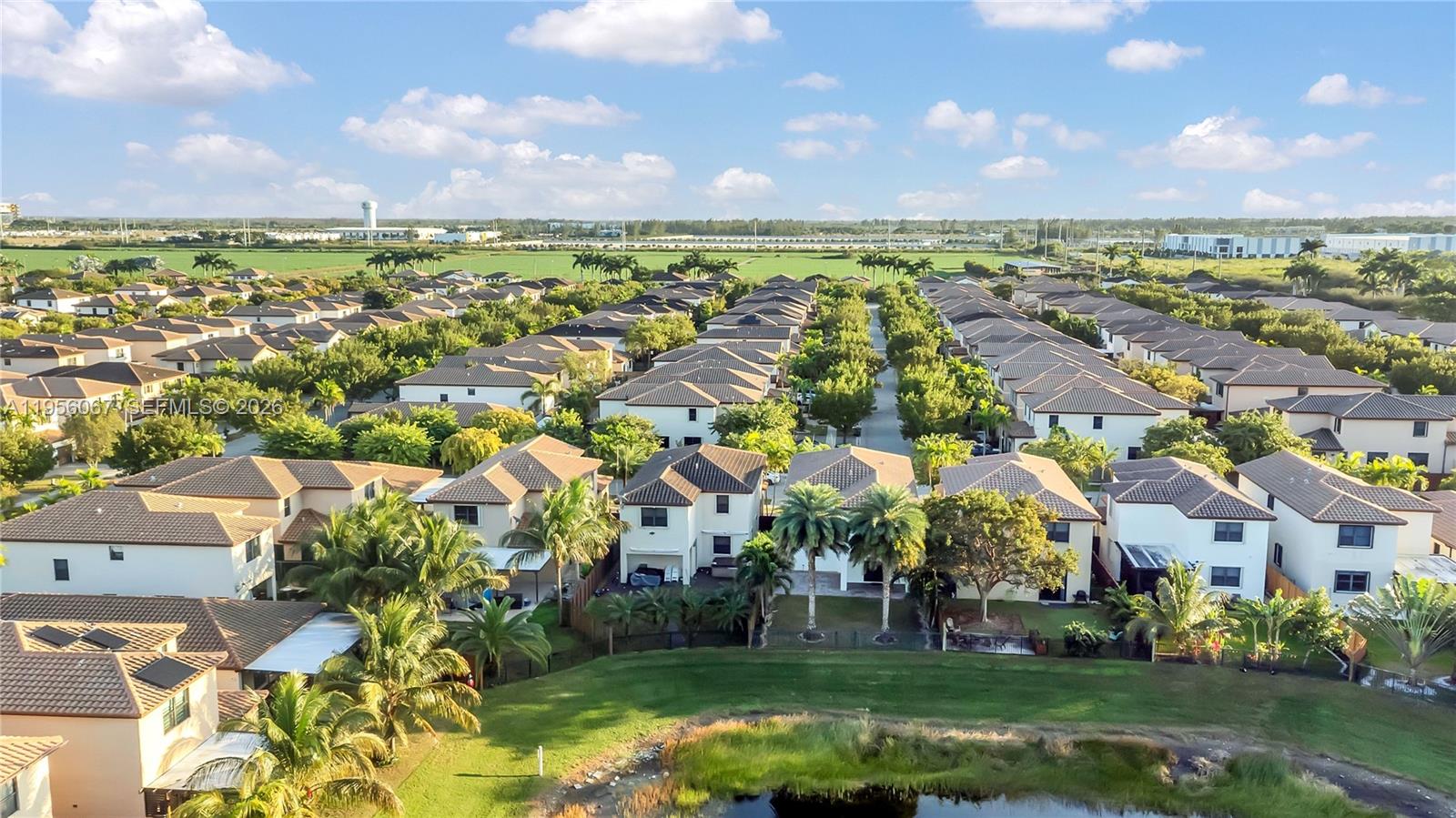 3401 Southeast 5th Street Homestead, FL 33033 - Photo 25 of 32 an aerial view of residential houses with outdoor space and swimming pool