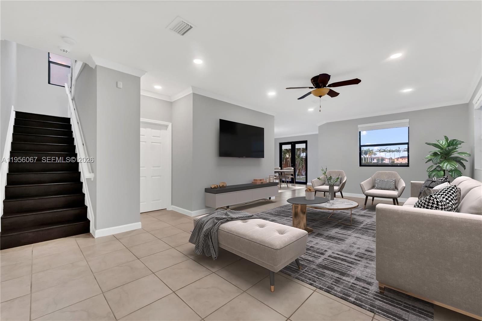 3401 Southeast 5th Street Homestead, FL 33033 - Photo 3 of 32 a living room with furniture and a flat screen tv