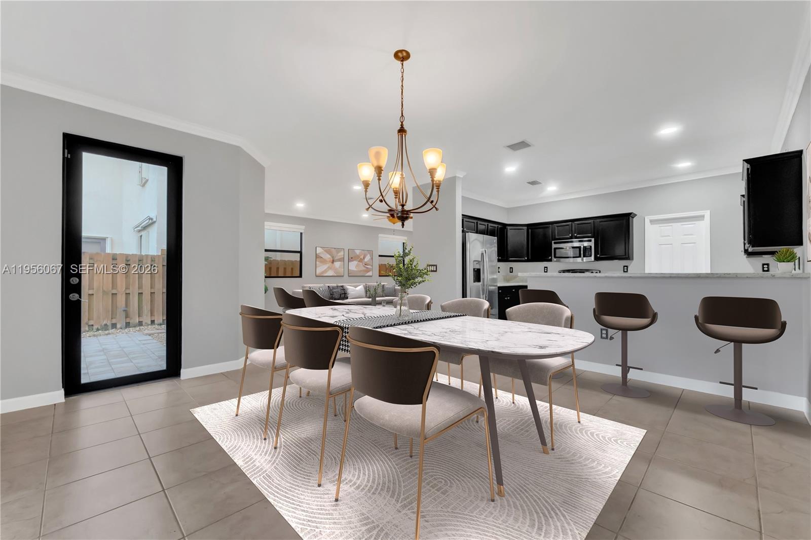 3401 Southeast 5th Street Homestead, FL 33033 - Photo 5 of 32 a view of a dining room with furniture