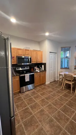 a kitchen with granite countertop lots of counter top space