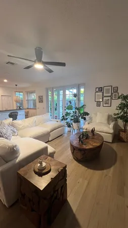 a room with table tennis table and windows