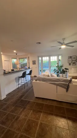 a bed room with bed and a tv