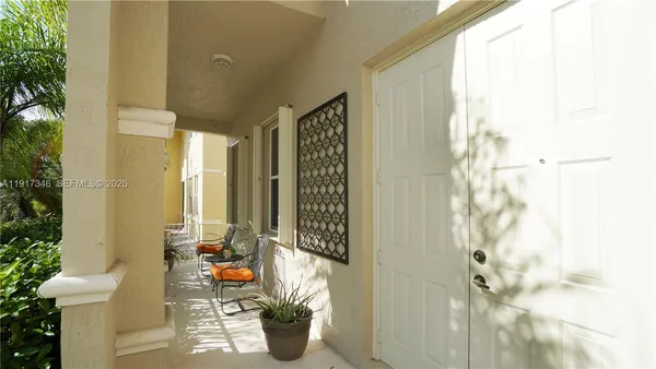 a view of a potted plants in front of a door