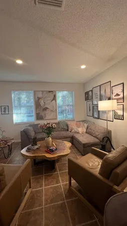 a dining room with a table and chairs
