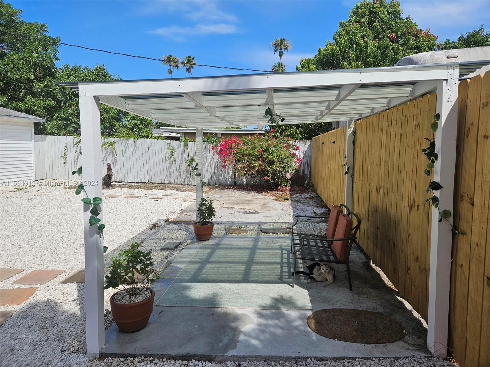 1107 Mayflower Road Fort Pierce, FL 34950 - Photo 2 of 21 a view of outdoor space and porch