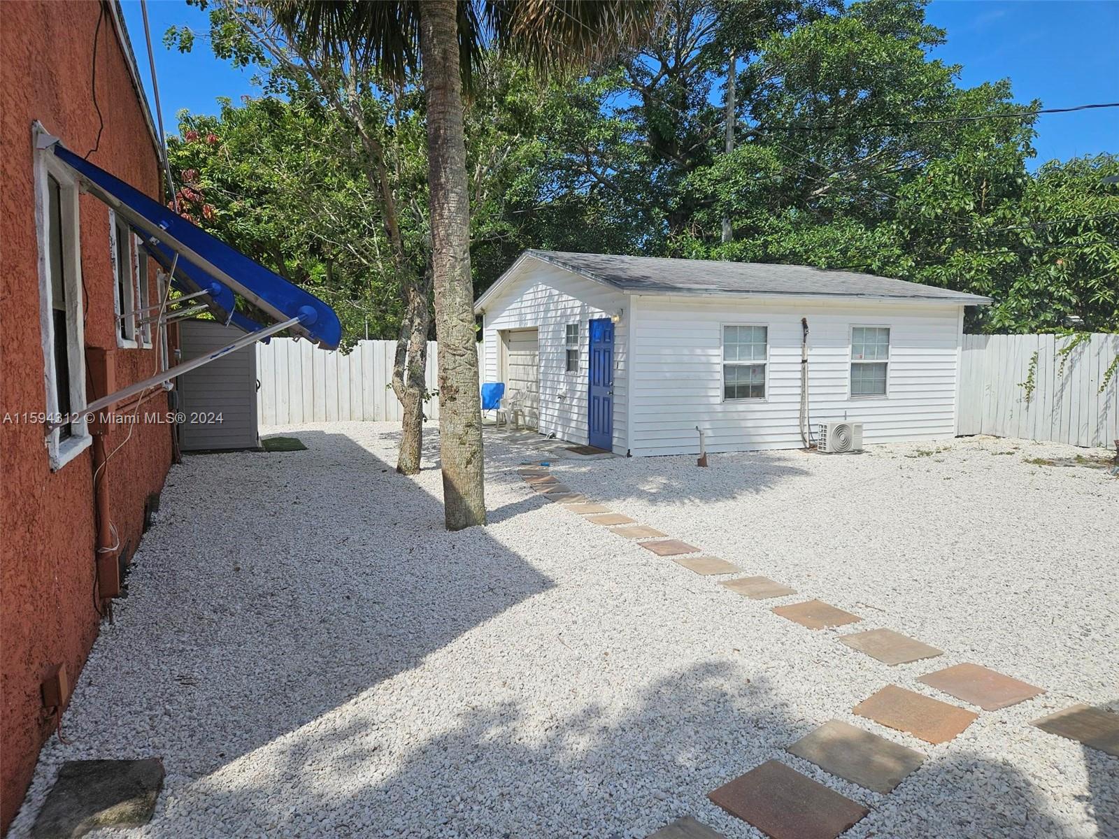1107 Mayflower Road Fort Pierce, FL 34950 - Photo 3 of 21 a view of a house with a patio