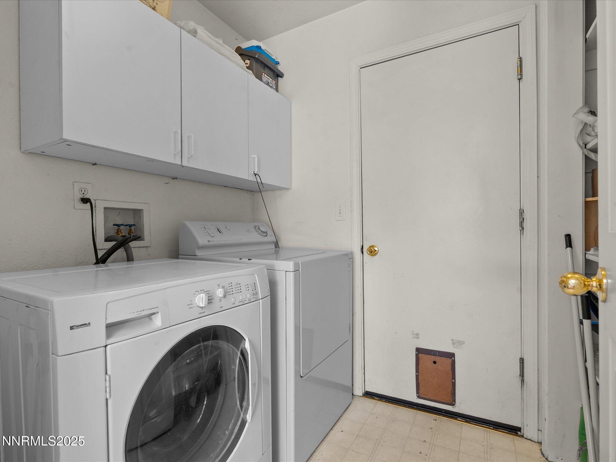 397 Nader Way Fernley, NV 89408 - Photo 13 of 27 a view of a storage & utility room with dryer and washer