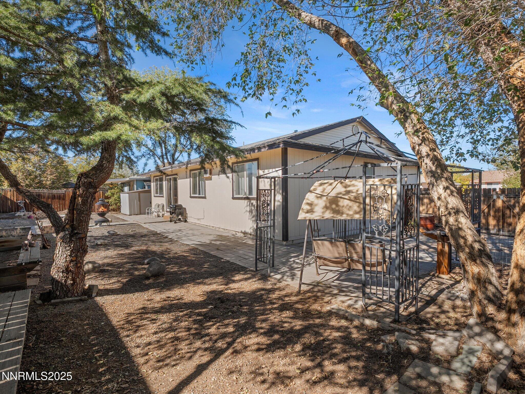 397 Nader Way Fernley, NV 89408 - Photo 26 of 27 a view of a house with a yard