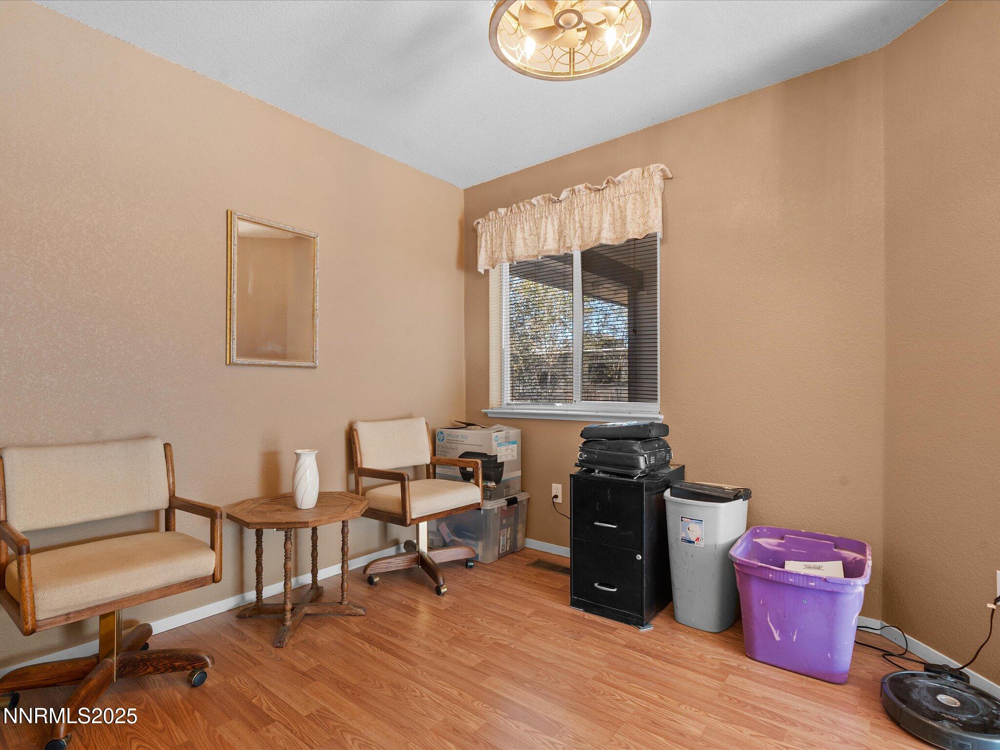 397 Nader Way Fernley, NV 89408 - Photo 6 of 27 a living room with furniture and a window