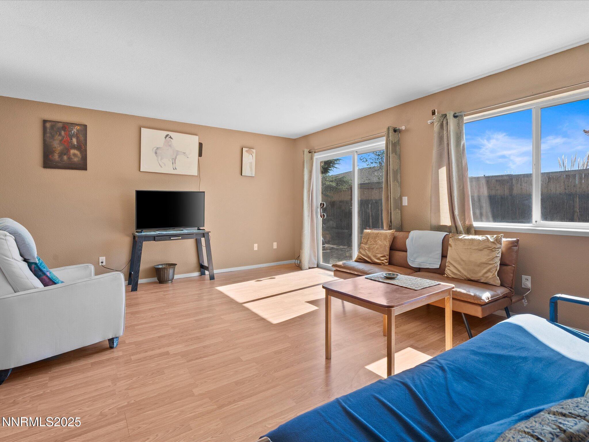 397 Nader Way Fernley, NV 89408 - Photo 10 of 27 a workspace with furniture and window