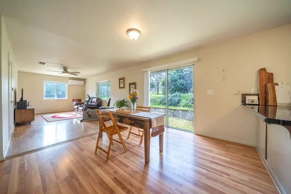 a view of a living room and dining room