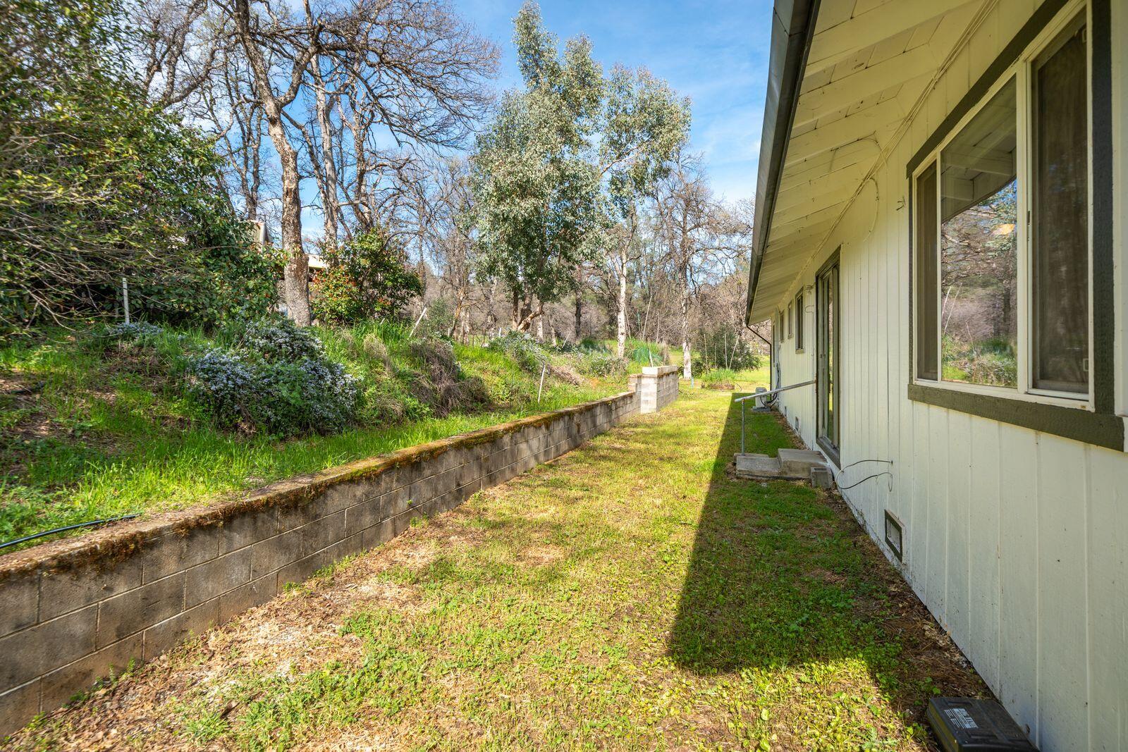 9380 Placer Road Redding, CA 96001 - Photo 31 of 47 a view of swimming pool with an outdoor seating