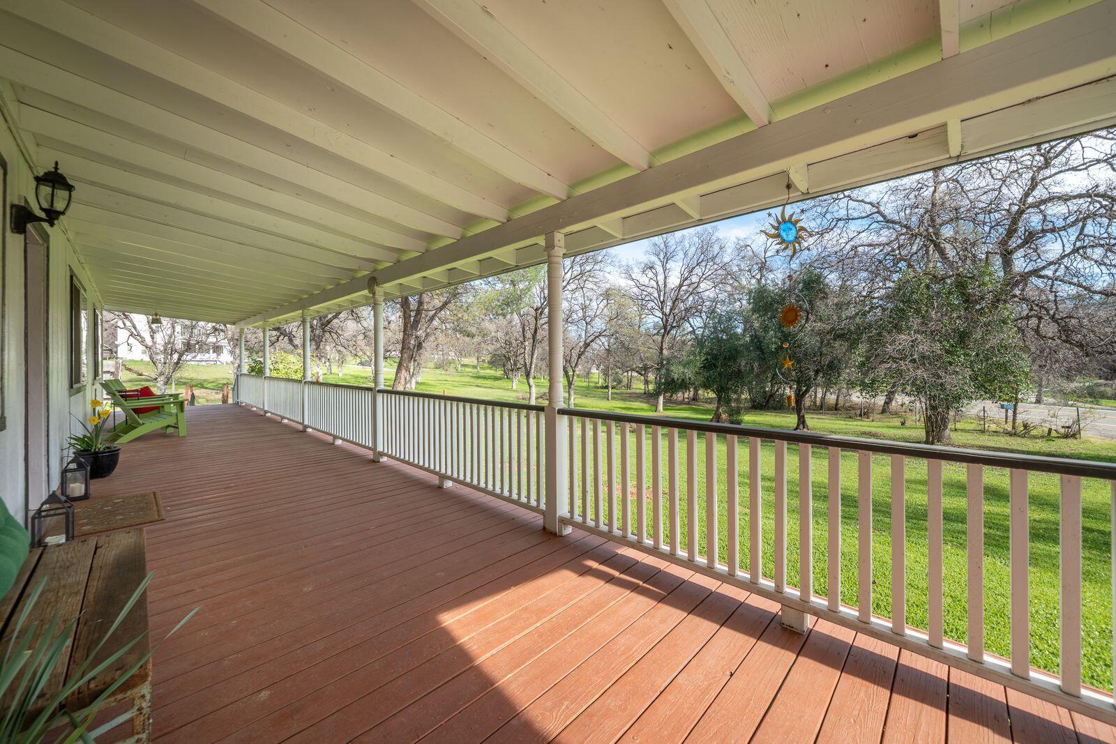 9380 Placer Road Redding, CA 96001 - Photo 4 of 47 a view of a balcony with wooden floor