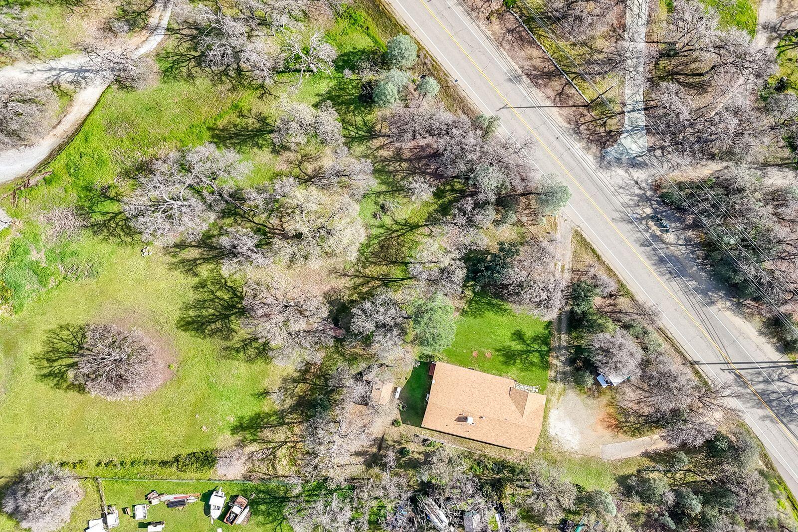 9380 Placer Road Redding, CA 96001 - Photo 47 of 47 a view of a tree with a yard