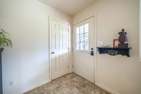 a view of a room that has a window in it