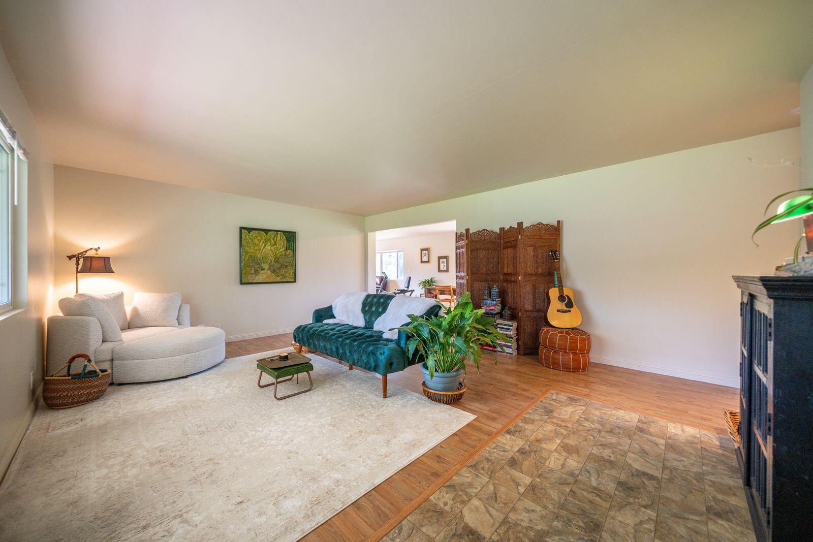 9380 Placer Road Redding, CA 96001 - Photo 10 of 47 a living room with furniture and a potted plant