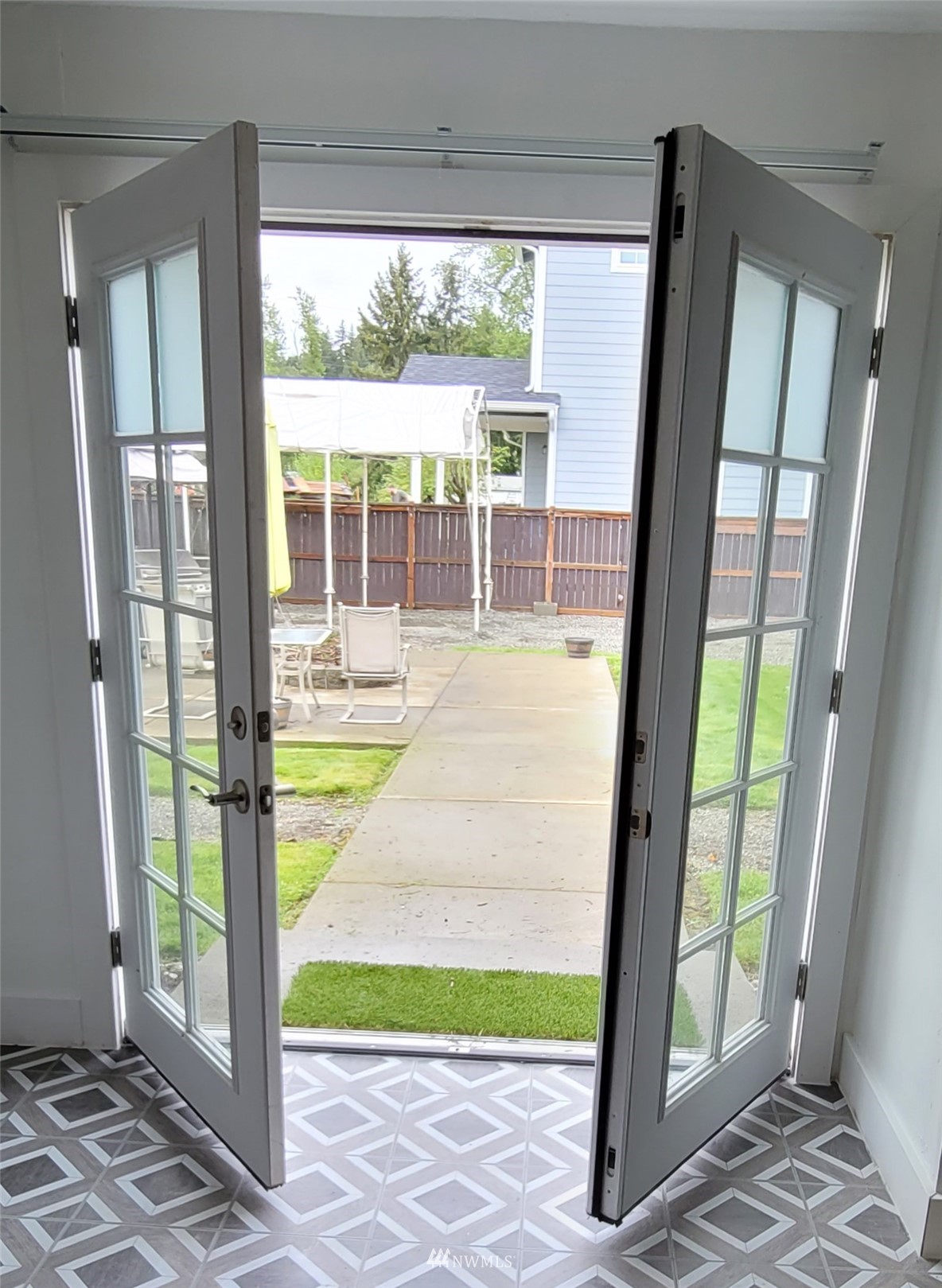 437 State Street Sumner, WA 98390 - Photo 12 of 25 a view of swimming pool from a porch