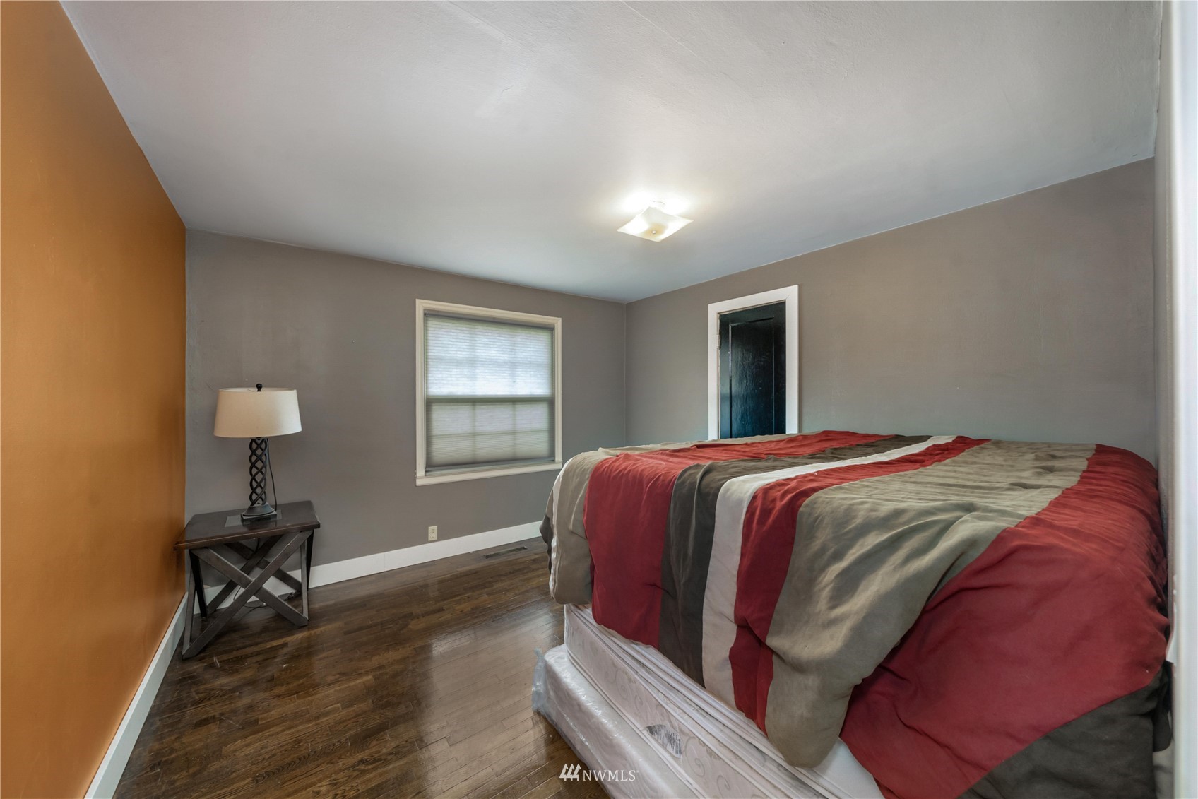 437 State Street Sumner, WA 98390 - Photo 13 of 25 a bed room with a bed and a window