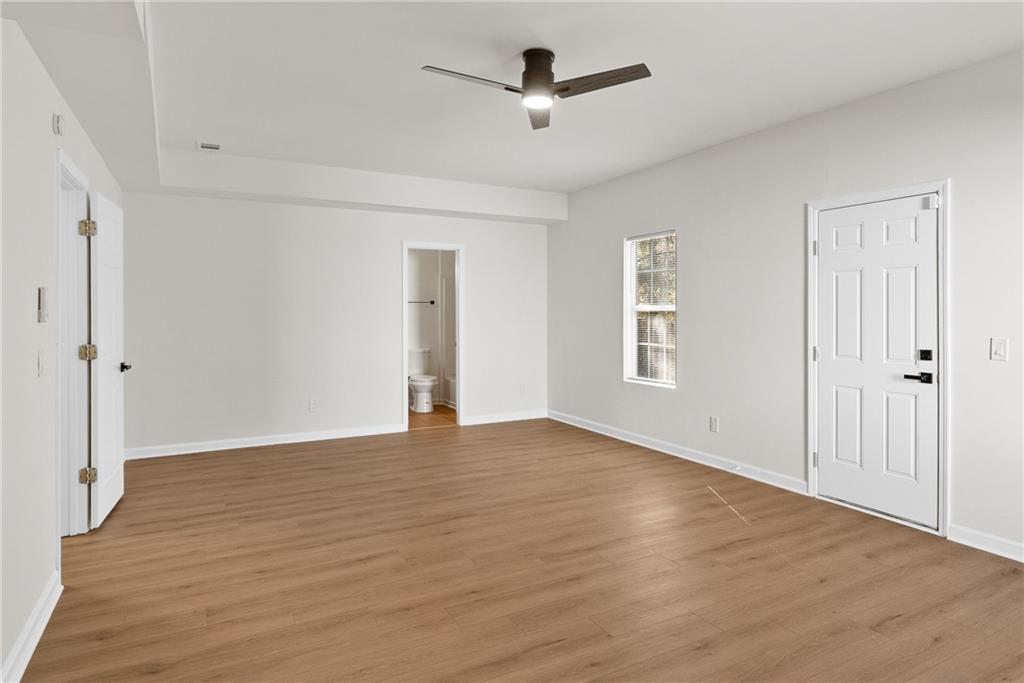 5805 Marbut Road Lithonia, GA 30058 - Photo 32 of 46 a view of an empty room with a window