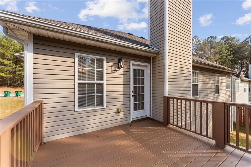 5805 Marbut Road Lithonia, GA 30058 - Photo 44 of 46 a view of a house with a balcony