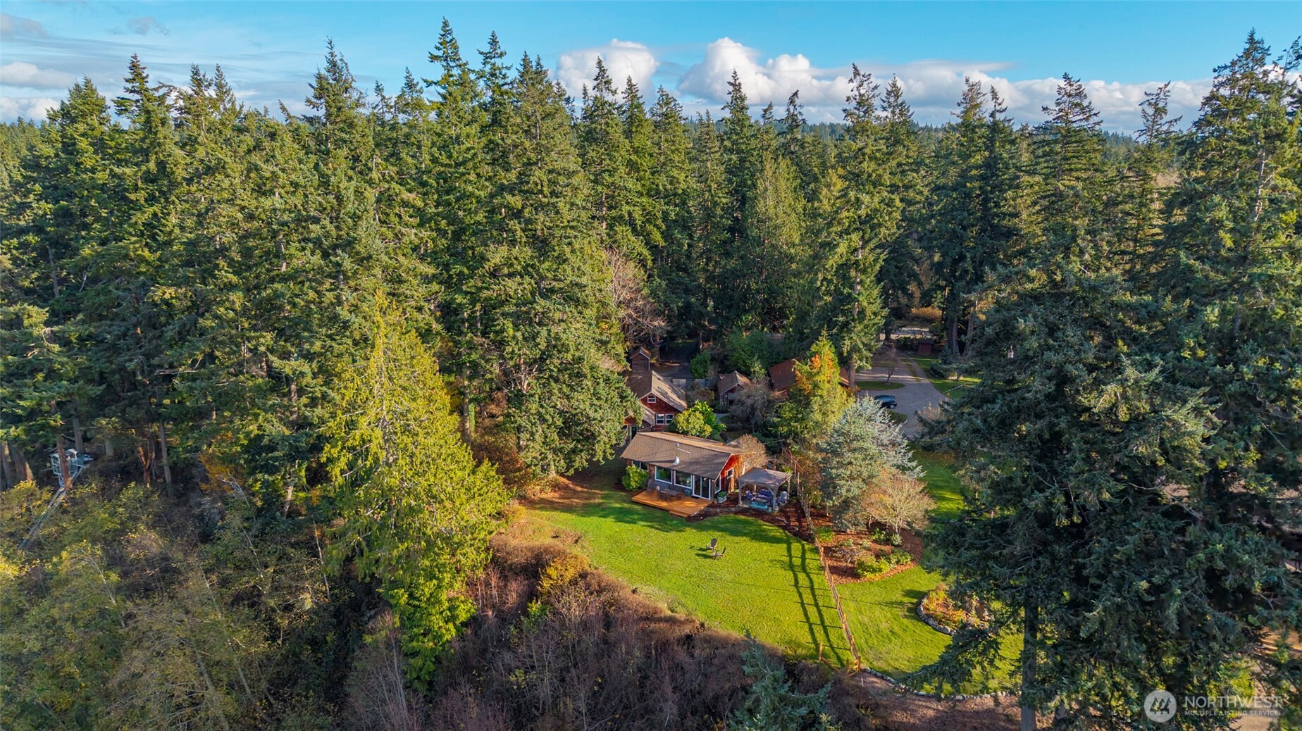 5222 East Harbor Road Freeland, WA 98249 - Photo 1 of 39 an aerial view of a house with a yard