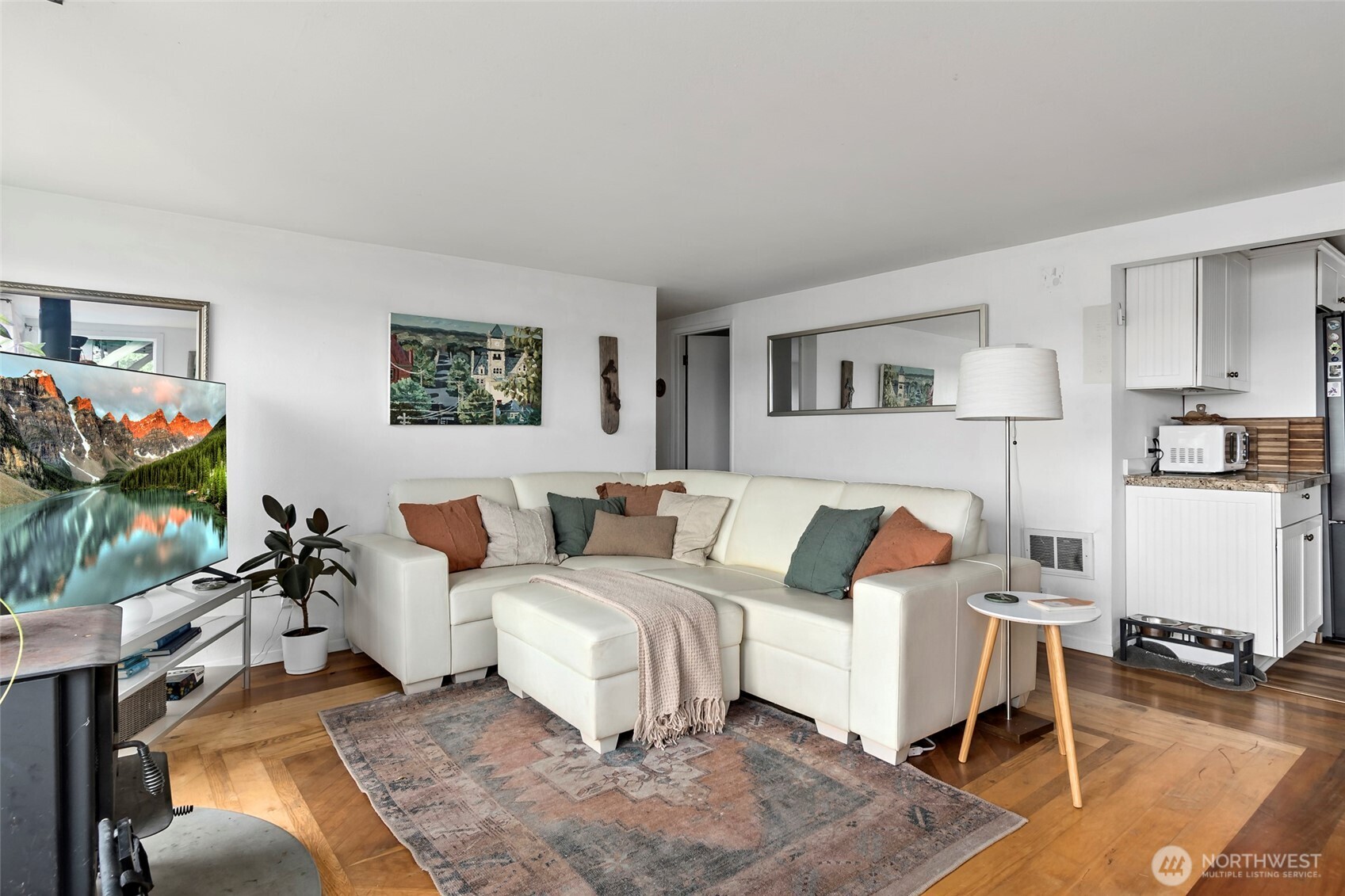 5222 East Harbor Road Freeland, WA 98249 - Photo 19 of 39 a living room with furniture and a flat screen tv