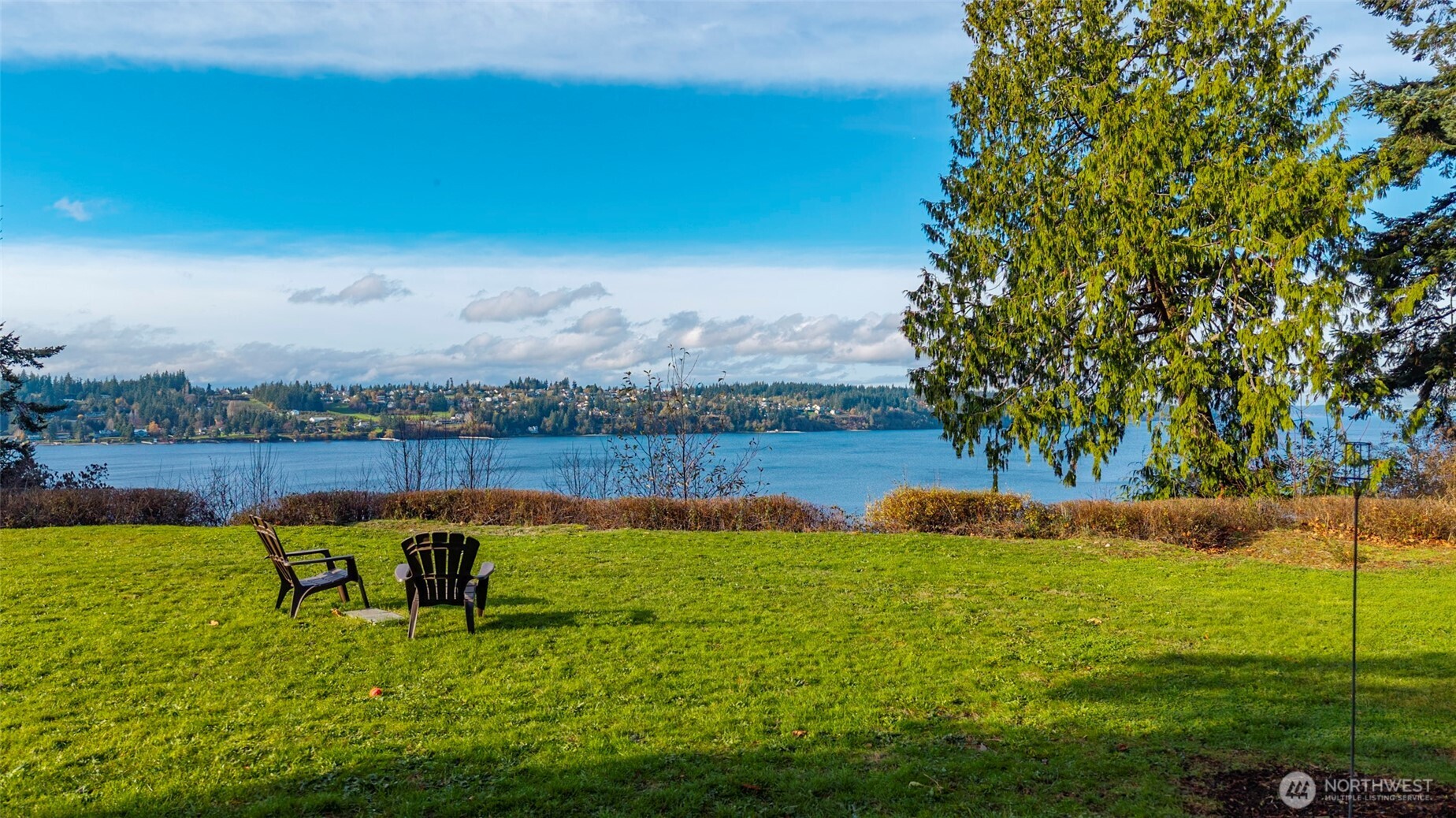 5222 East Harbor Road Freeland, WA 98249 - Photo 35 of 39 a view of a lake with a yard