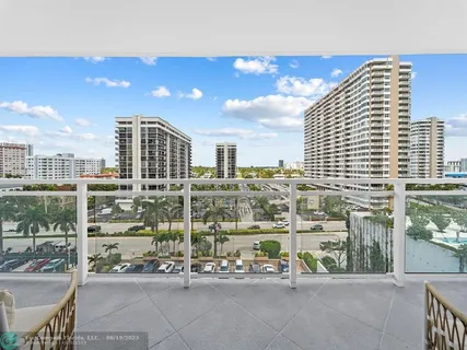 a view of a tall building from a roof deck
