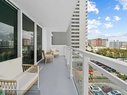 a view of balcony with a potted plant