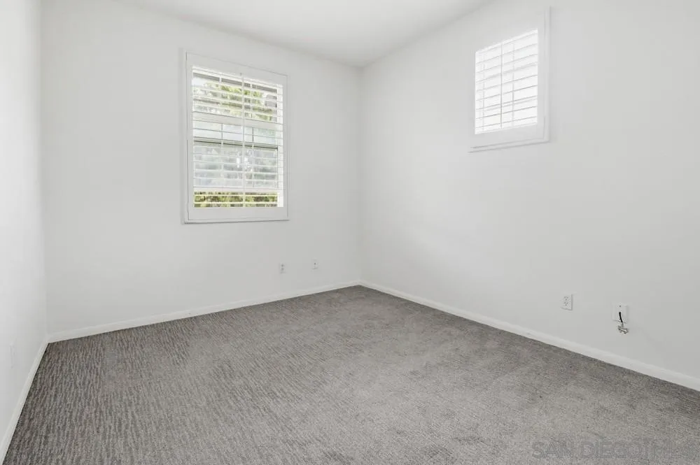 1293 Fools Gold Way, Unit 3 Chula Vista, CA 91913 - Photo 20 of 28 an empty room with a window