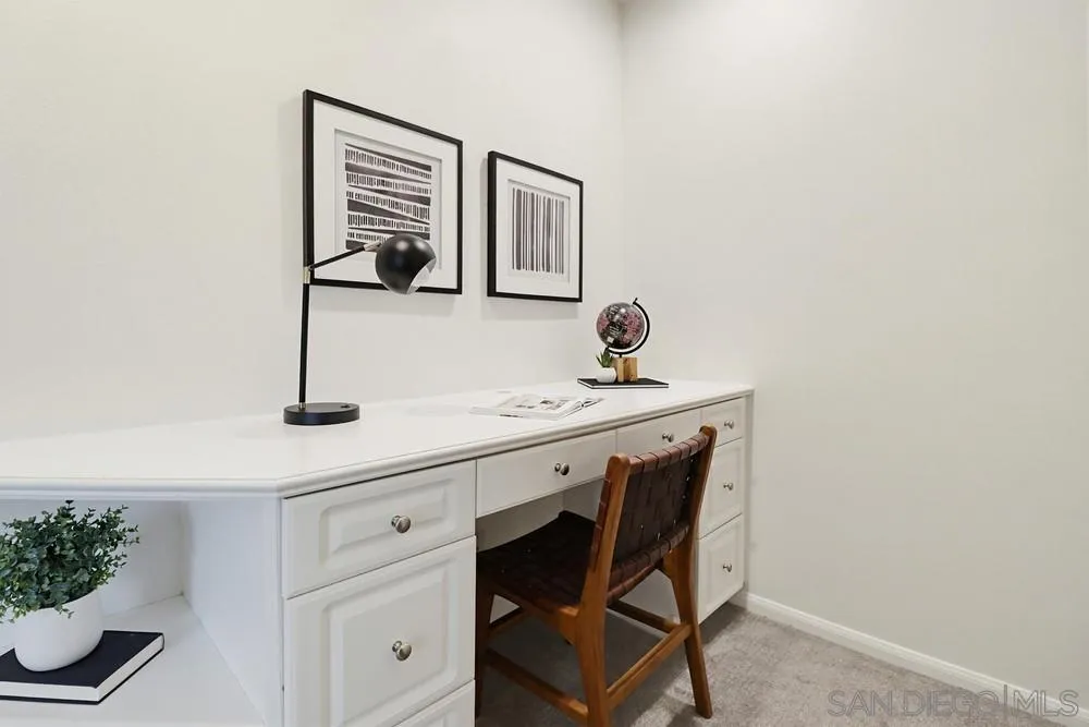 1293 Fools Gold Way, Unit 3 Chula Vista, CA 91913 - Photo 24 of 28 a bathroom with a sink and a mirror