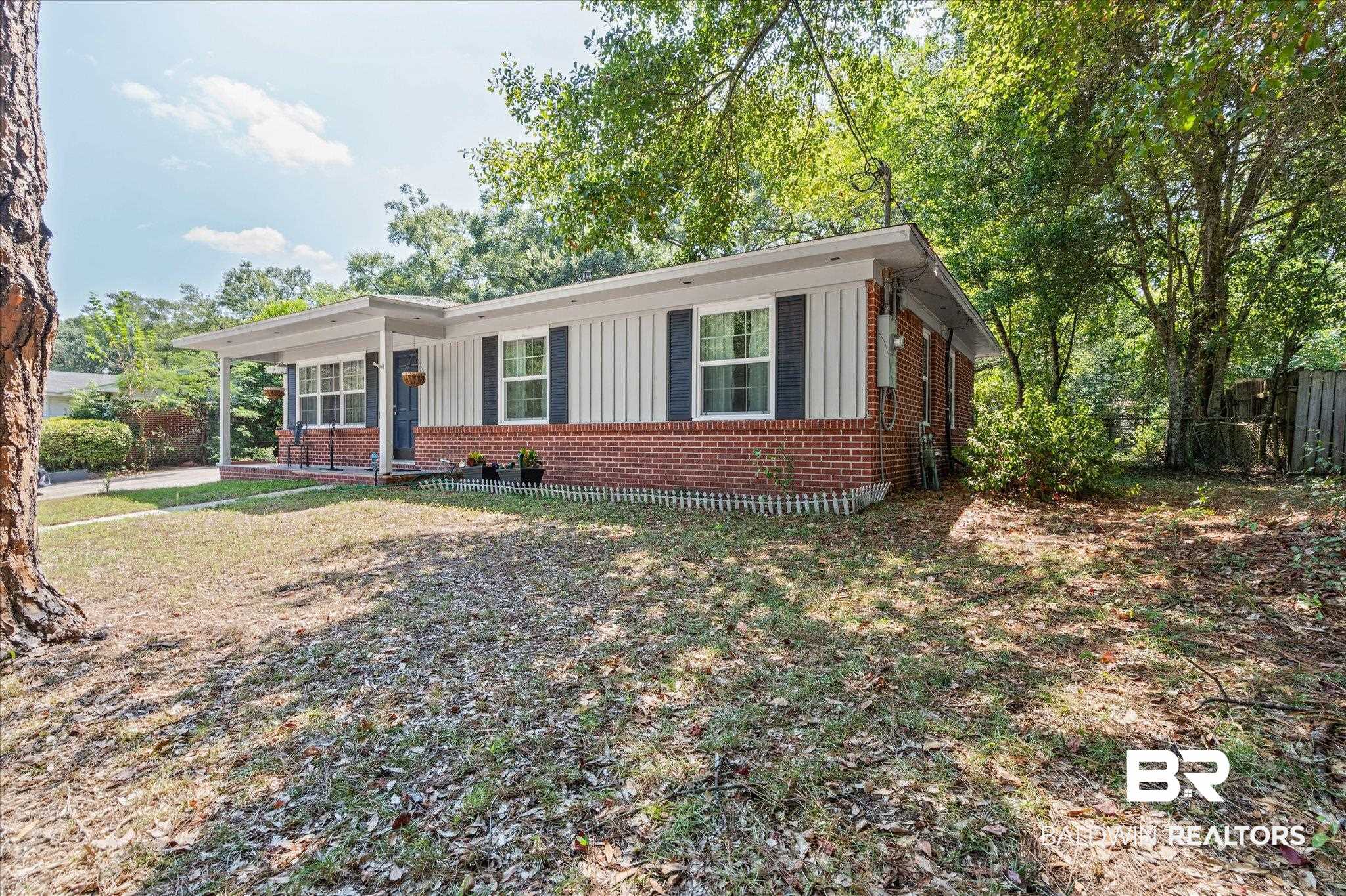 5609 Diane Court Mobile, AL 36618 - Photo 20 of 22 Ranch-style house featuring board and batten siding and brick siding