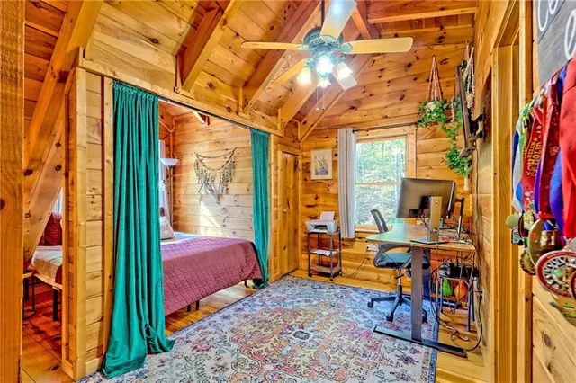 a room with furniture and a rug