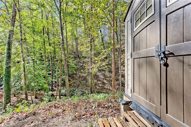 a backyard of a house with lots of green space
