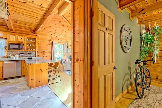 a view of a patio with a table and chairs